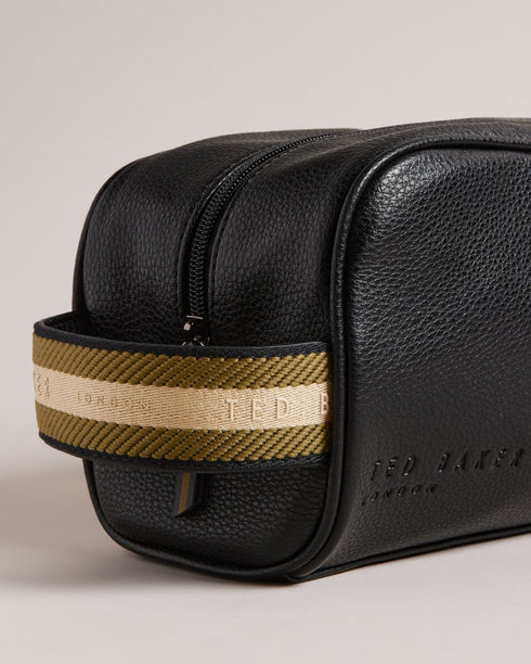 KAIIRO-Gifts-Your Toiletries Can Travel In Style Too. With Its Sleek Design And Smooth Leather Kaiiro Is A First-class Ticket For Your Personal Items. The Zip Fastening Keeps Everything Secure While The Spacious Interior Offers Plenty Of Room For Your Essentials. Washbag Faux leather Branded webbing handle Zip fastening Debossed logo Dimensions: 13cm x 25cm x 11cm- Ted Baker Romania